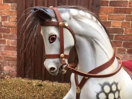 extra carving on neck of lines rocking horse